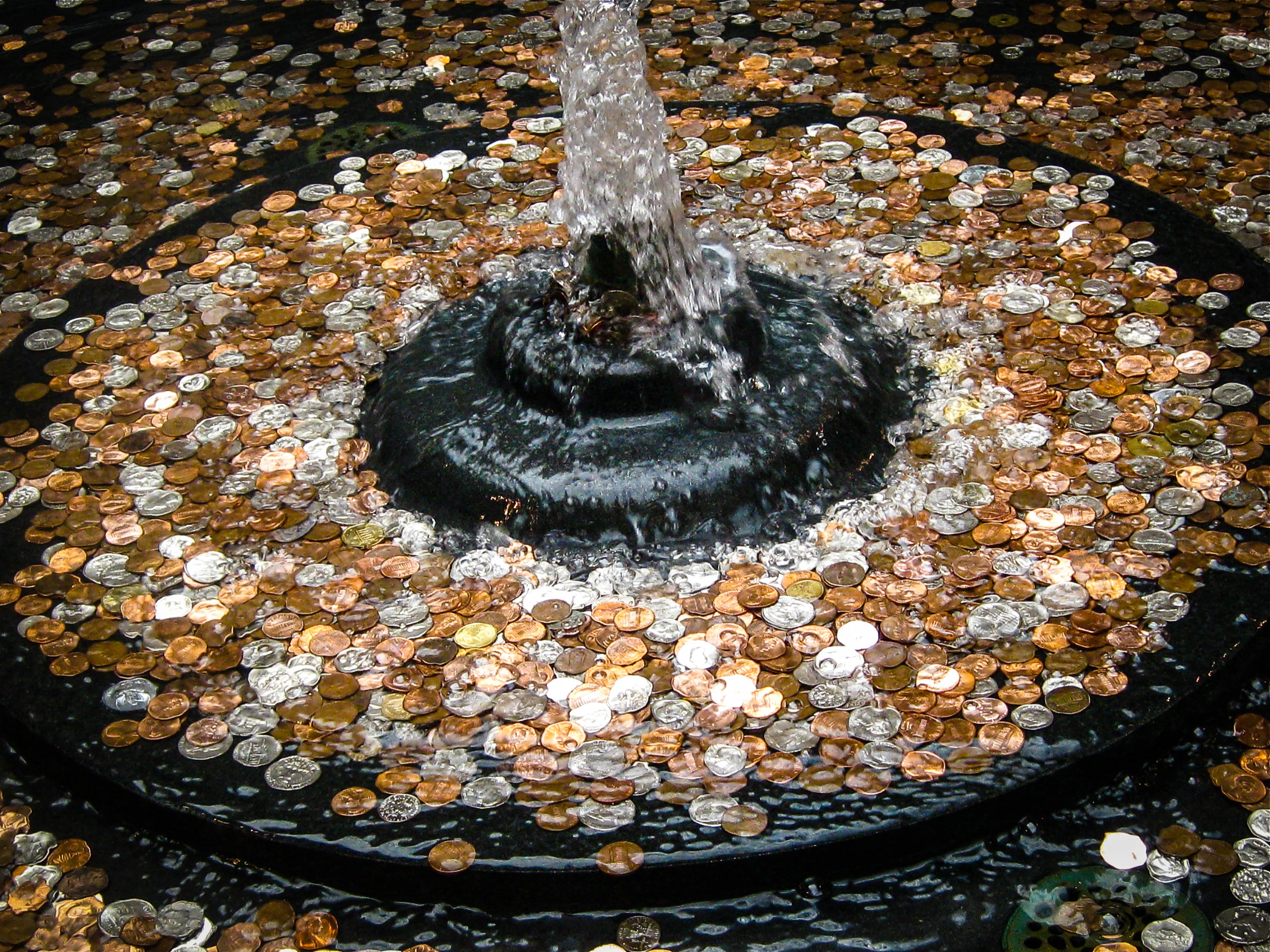 Why Do We Throw Coins into Fountains?